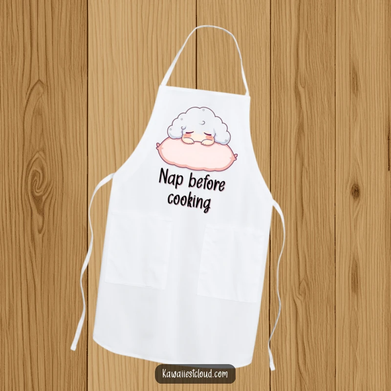 Funny kitchen apron with a content cloud character napping on a pillow, perfect for relaxed cooking.