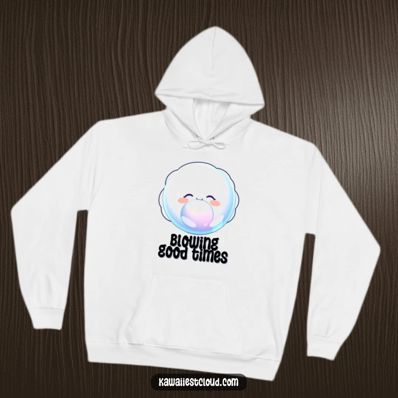 Funny hoodie showing a delighted cloud character blowing a giant, iridescent bubble, perfect for staying cozy and whimsical.