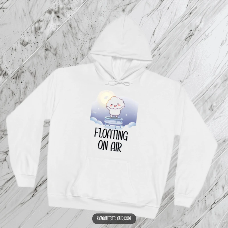Funny Hoodie: A delightful cloud character energetically bouncing on a shimmering trampoline made of pure moonlight.