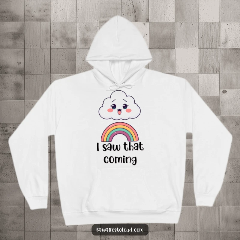 Funny hoodie featuring a surprised cartoon cloud peeking over a tiny rainbow, perfect for a comical and cozy feel.