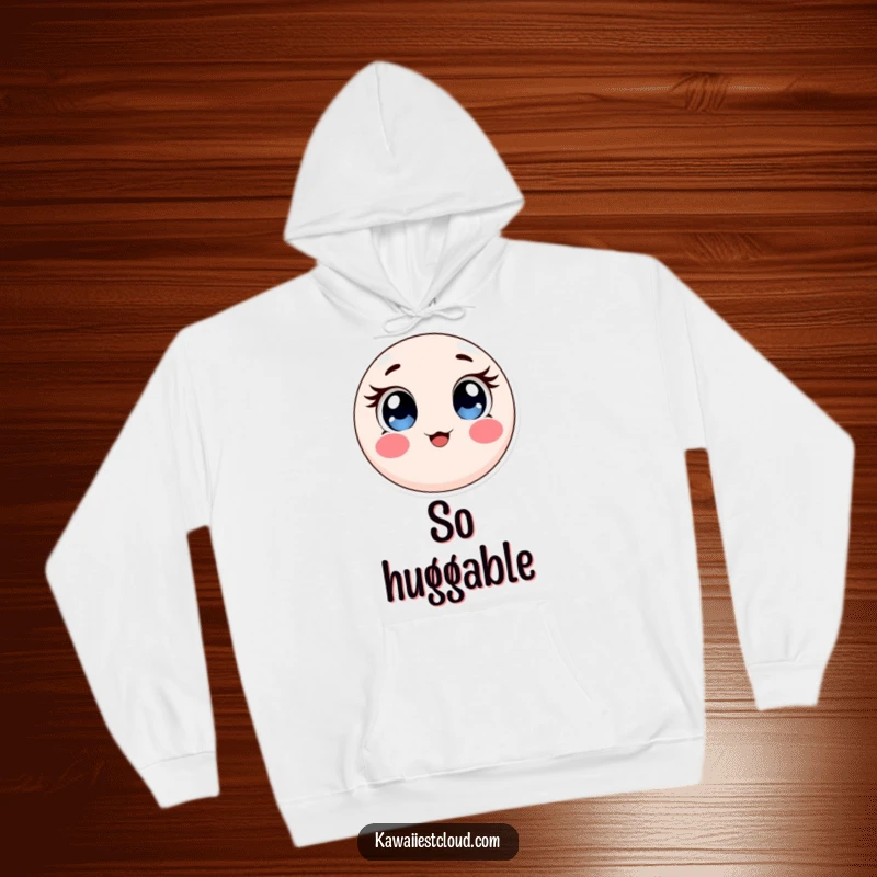 Funny hoodie featuring a round, soft object with large, expressive eyes and rosy cheeks, perfect for cozy, sweet wear.