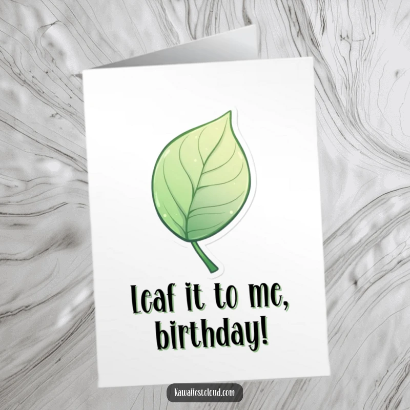 Elegant free printable birthday card showcasing a miniature, stylized leaf with an artistic, graceful curve, perfect for sophisticated greetings.