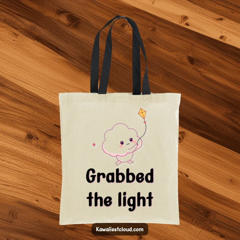 Funny tote bag featuring a playful cloud character chasing a kite made of light, great for carrying daily items.